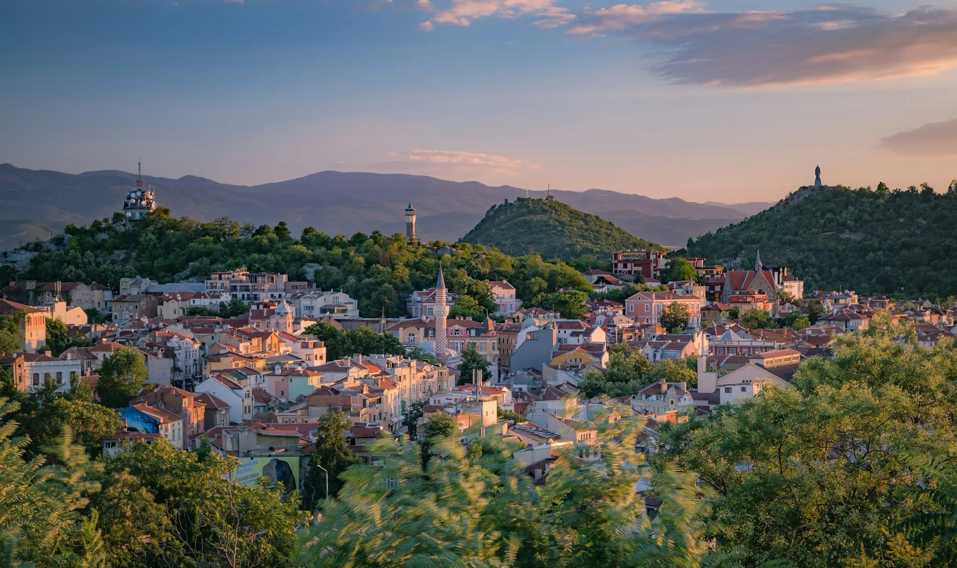 Plovdiv, Bulgaria a small town surrounded by trees and mountains